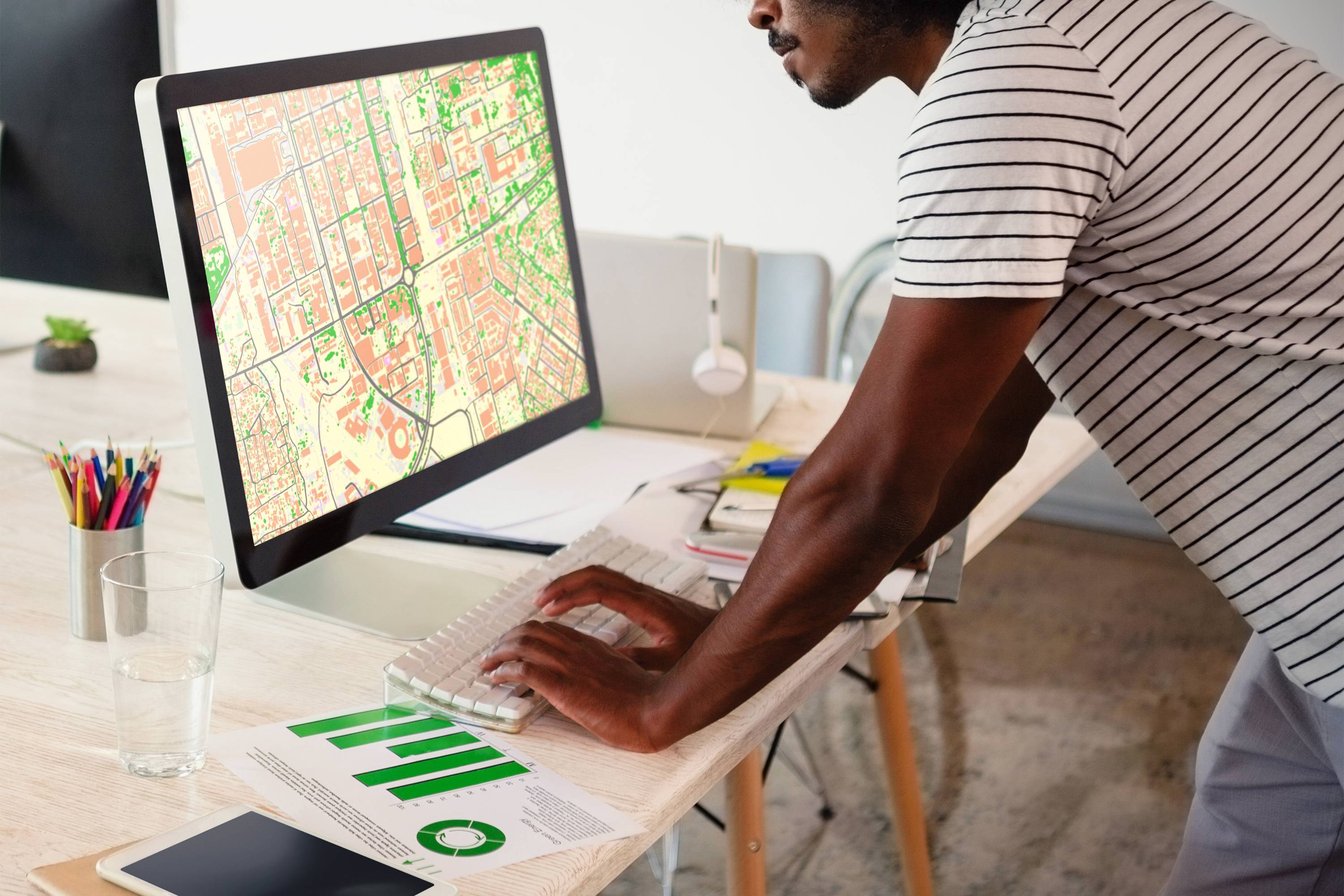 Man looking at map on screen