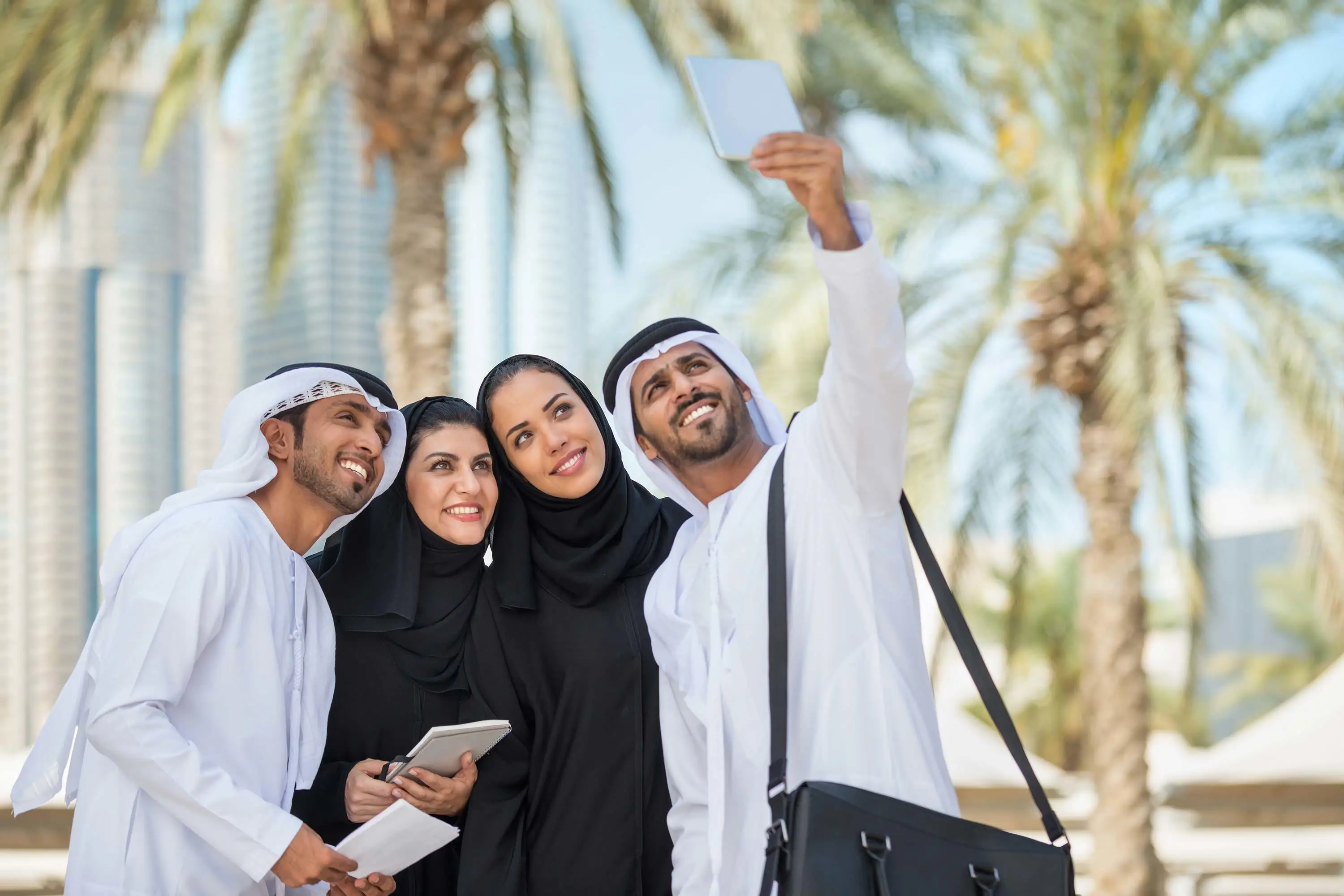 Four people taking a selfie
