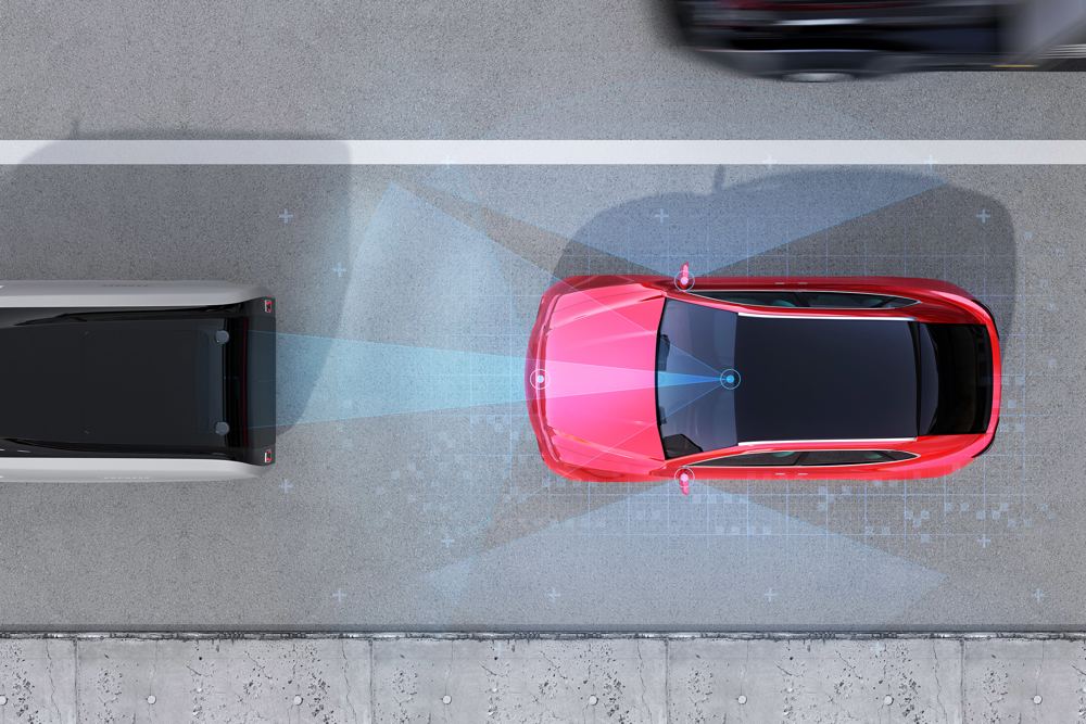 Red driverless car using sensors