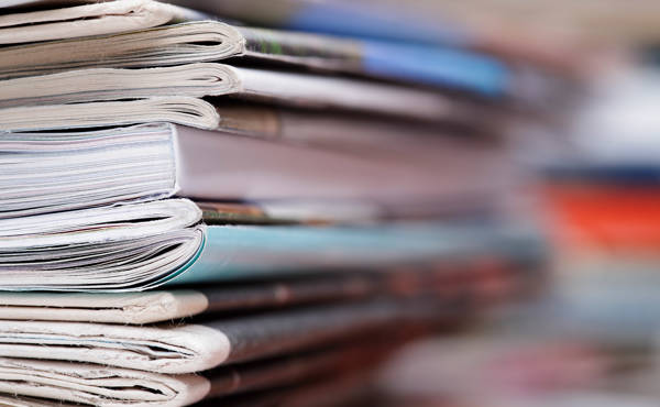 Close up stack of magazines