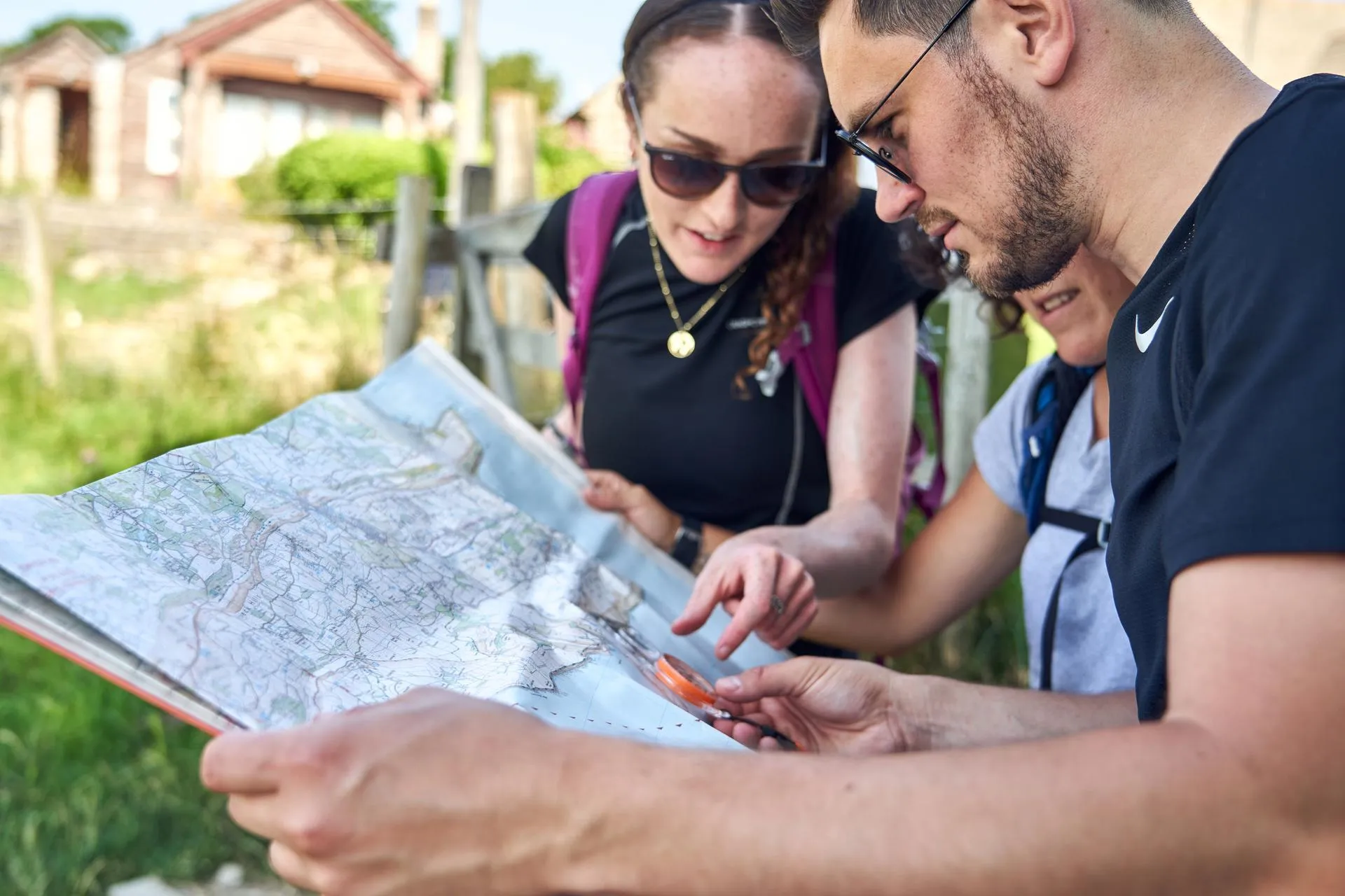 people reading a map